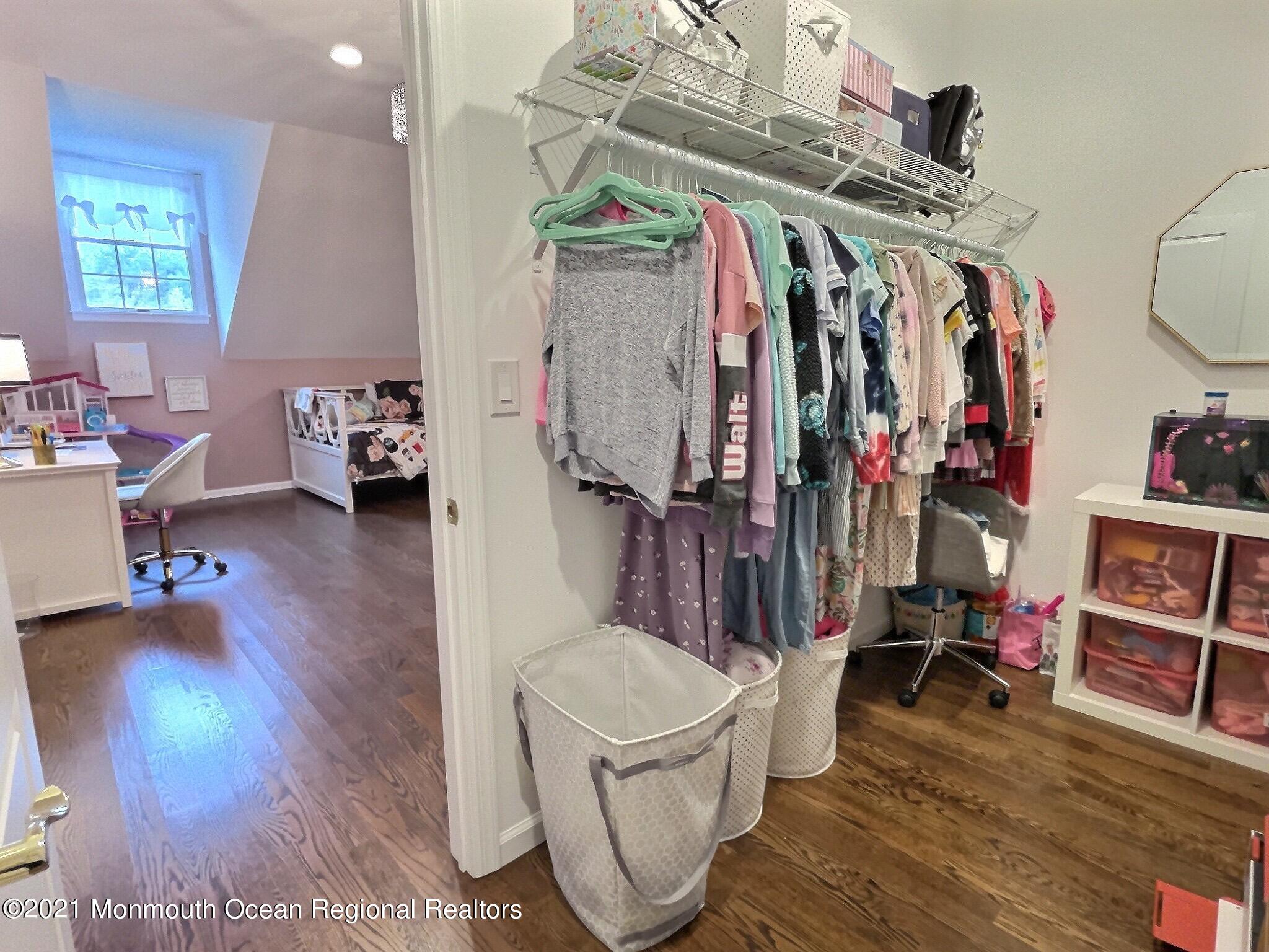 21 Dearborn Drive Holmdel, NJ 07733 - Photo 27 of 48 a view of a room with gym equipment