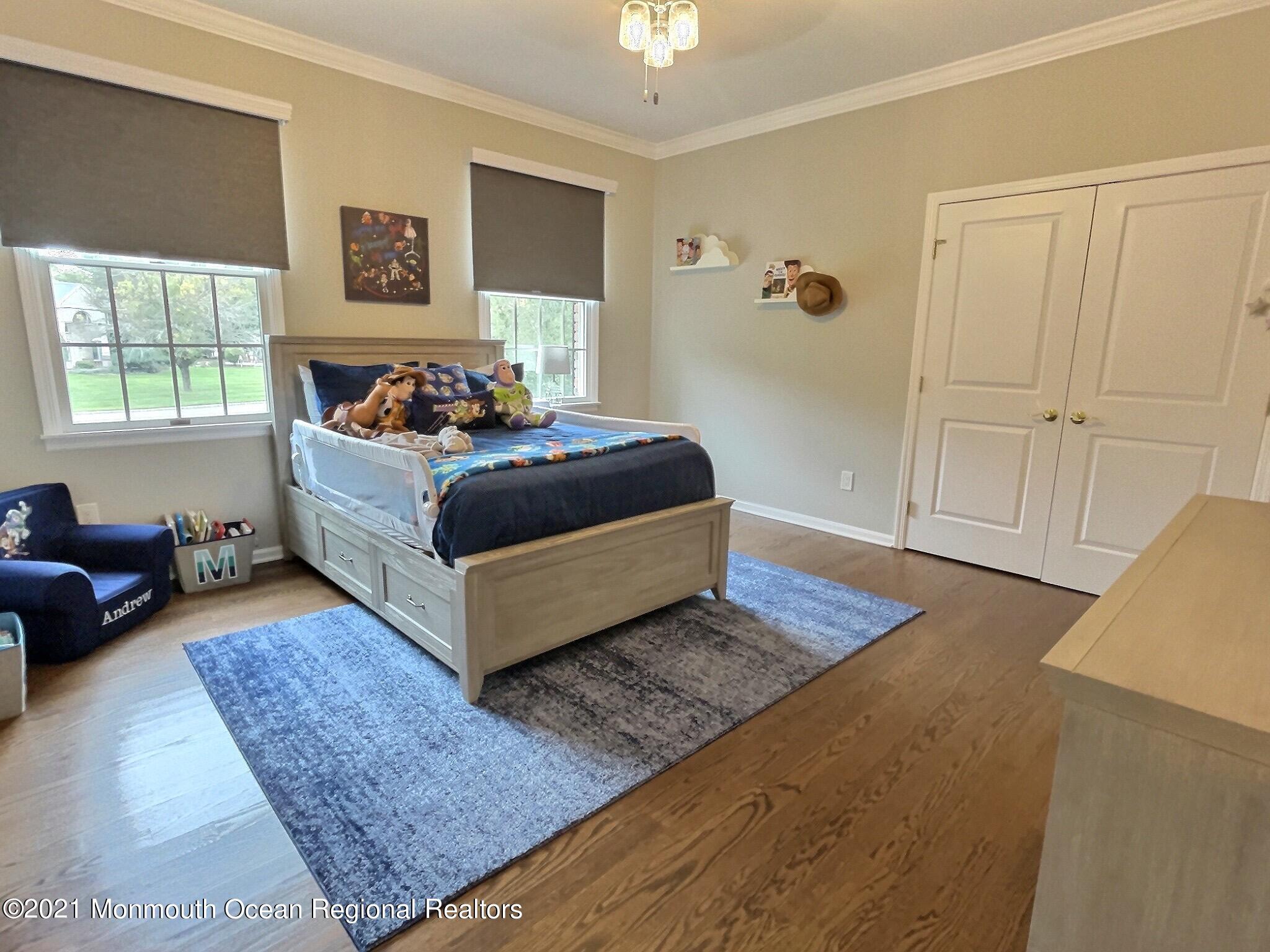 21 Dearborn Drive Holmdel, NJ 07733 - Photo 28 of 48 a living room with couch and a window