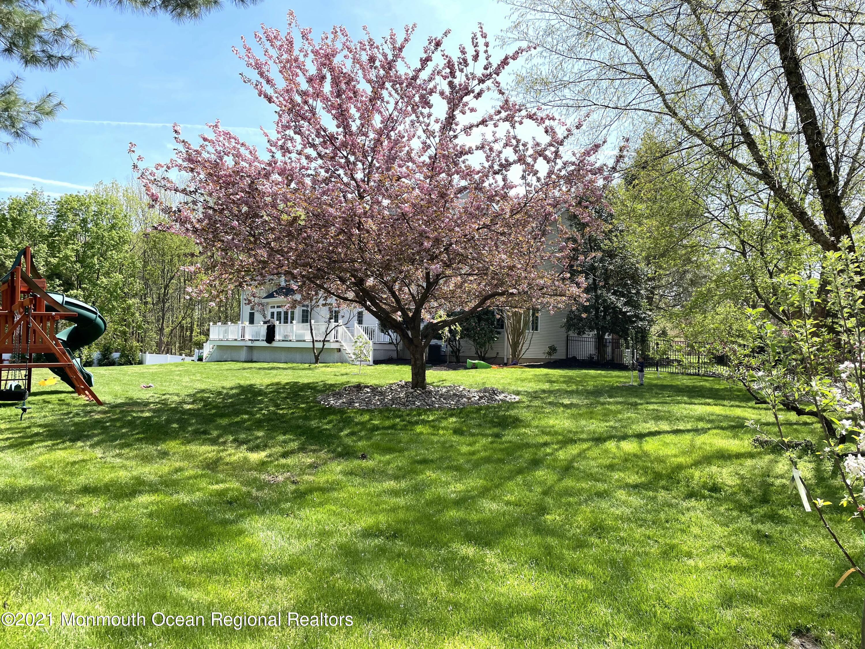 21 Dearborn Drive Holmdel, NJ 07733 - Photo 44 of 48 a view of a park with large trees