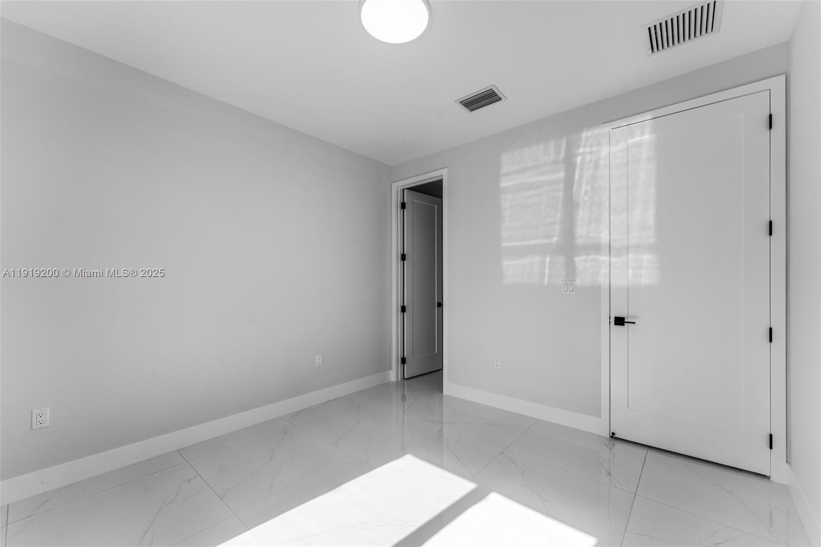 12381 Southwest 220th Street Miami, FL 33170 - Photo 13 of 20 a view of an empty room