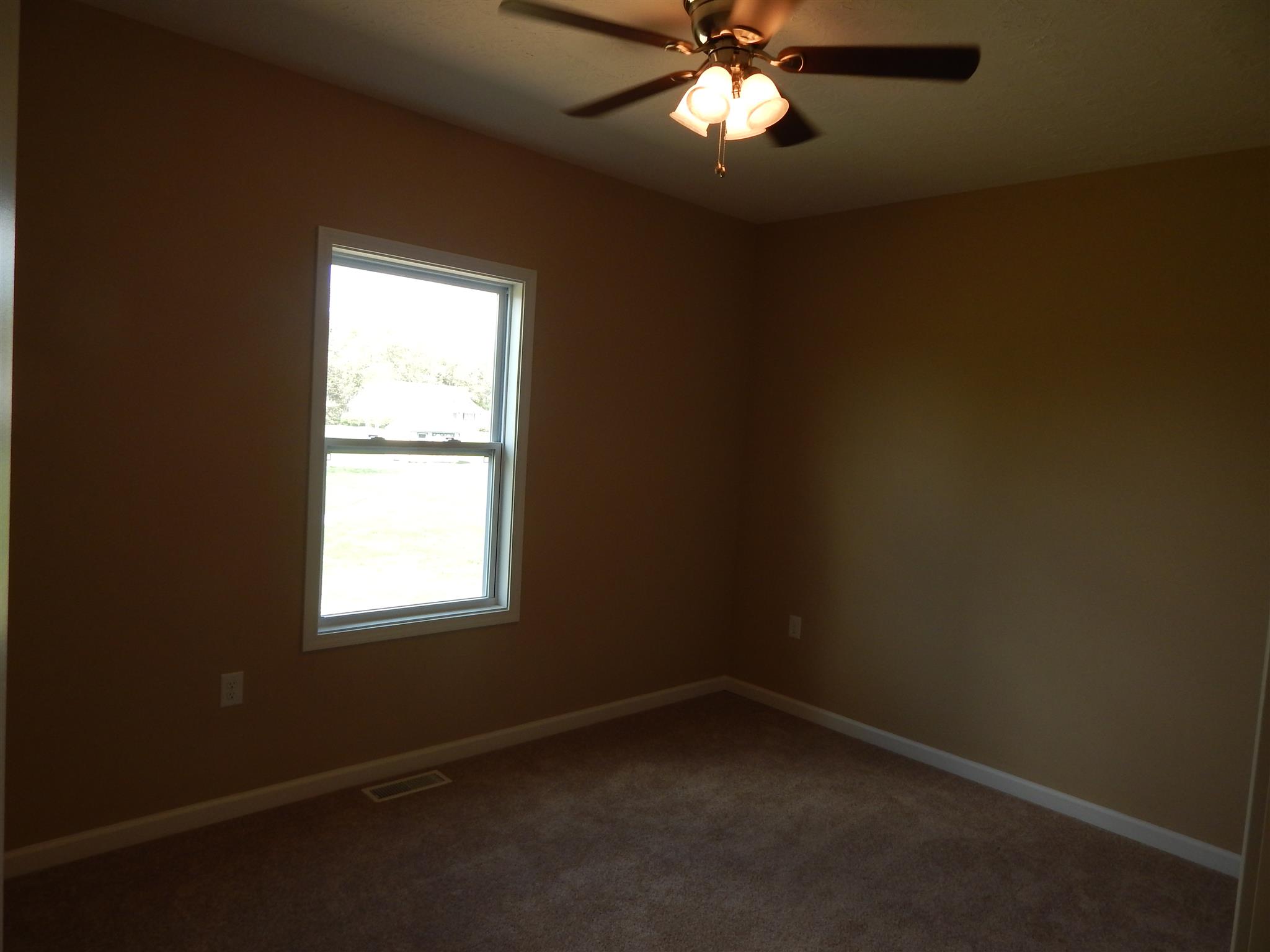 574 Cook Road Portland, TN 37148 - Photo 12 of 12 an empty room with a window