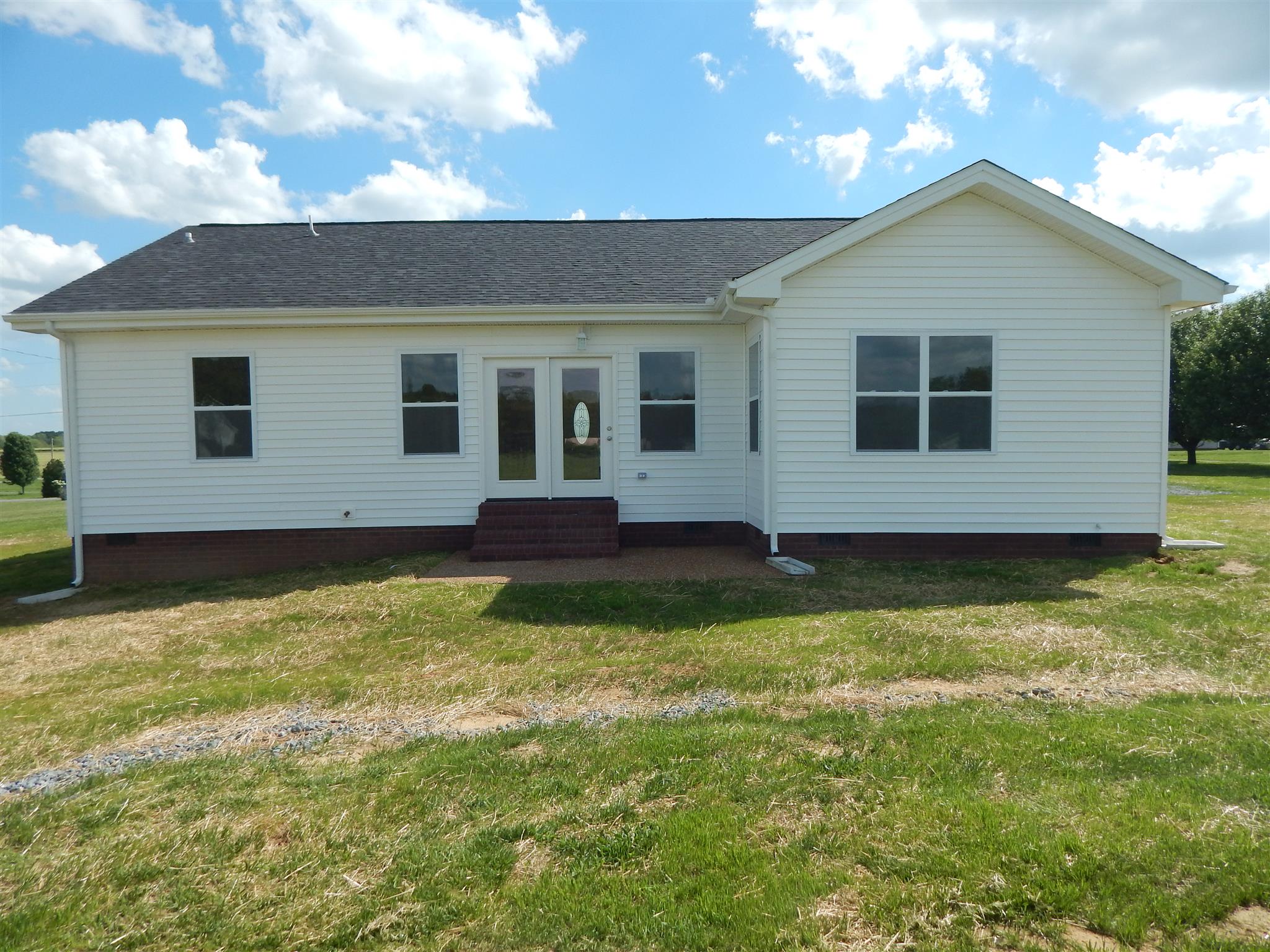 574 Cook Road Portland, TN 37148 - Photo 2 of 12 a view of a house with a yard