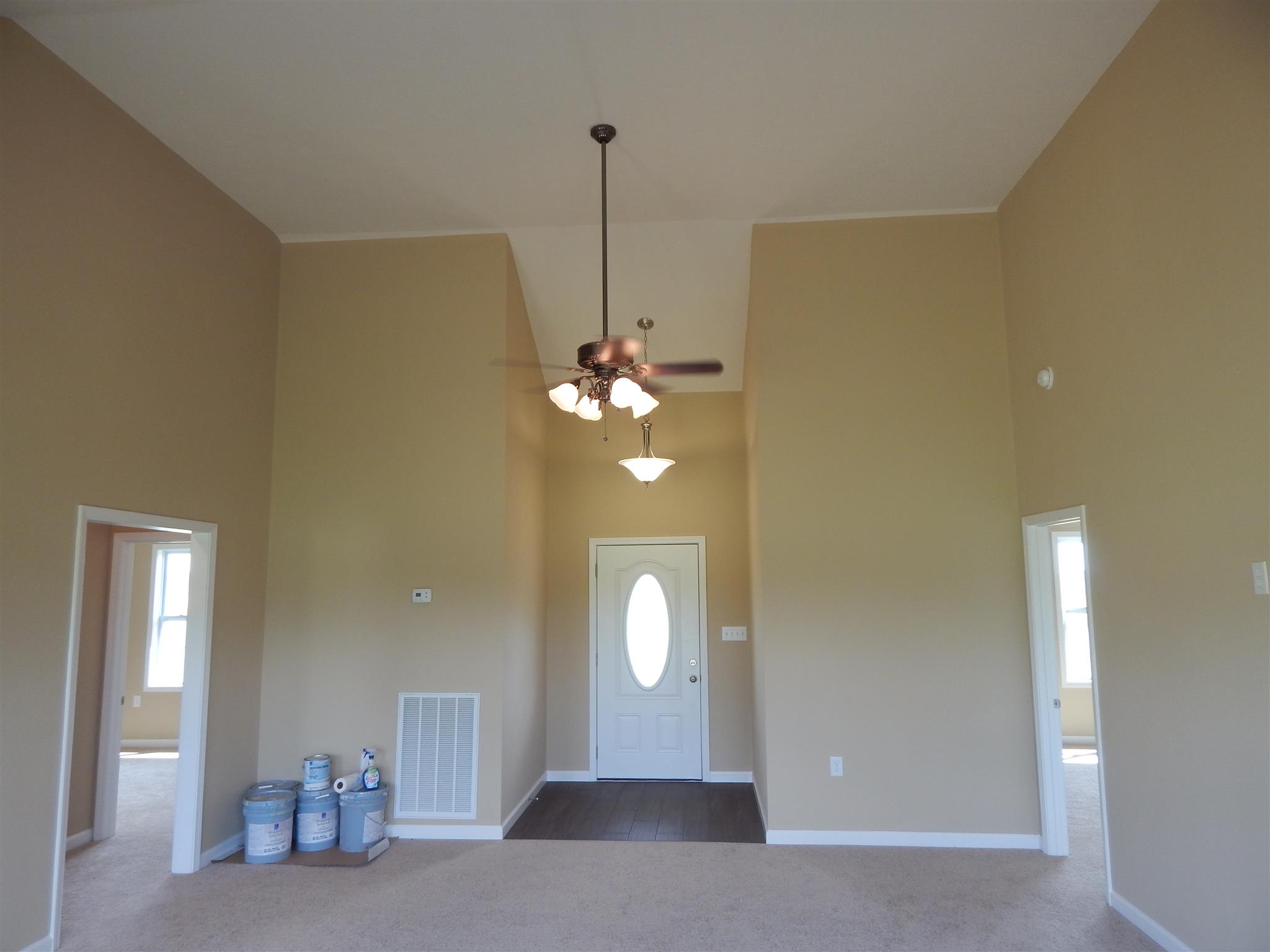 574 Cook Road Portland, TN 37148 - Photo 3 of 12 a view of a room with a chandelier fan and a rug