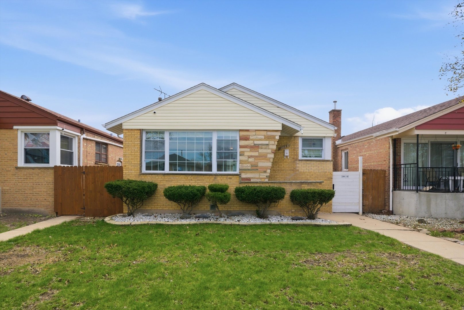 3853 West 83rd Place Chicago, IL 60652 - Photo 1 of 30 a front view of a house with a yard