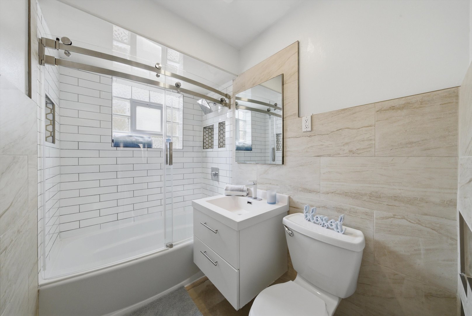3853 West 83rd Place Chicago, IL 60652 - Photo 13 of 30 a bathroom with a toilet sink and shower