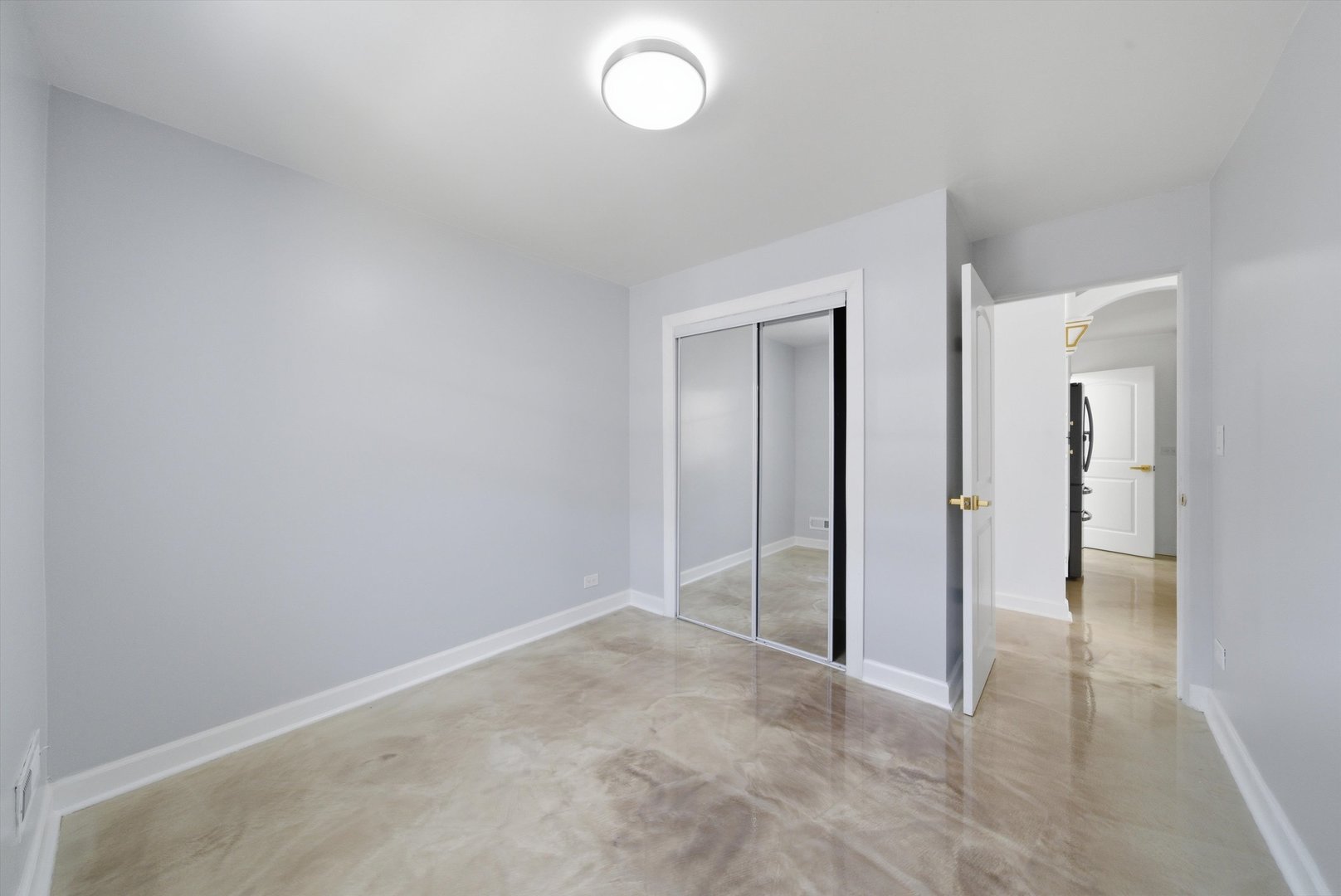 3853 West 83rd Place Chicago, IL 60652 - Photo 17 of 30 an empty room with fan and entrance