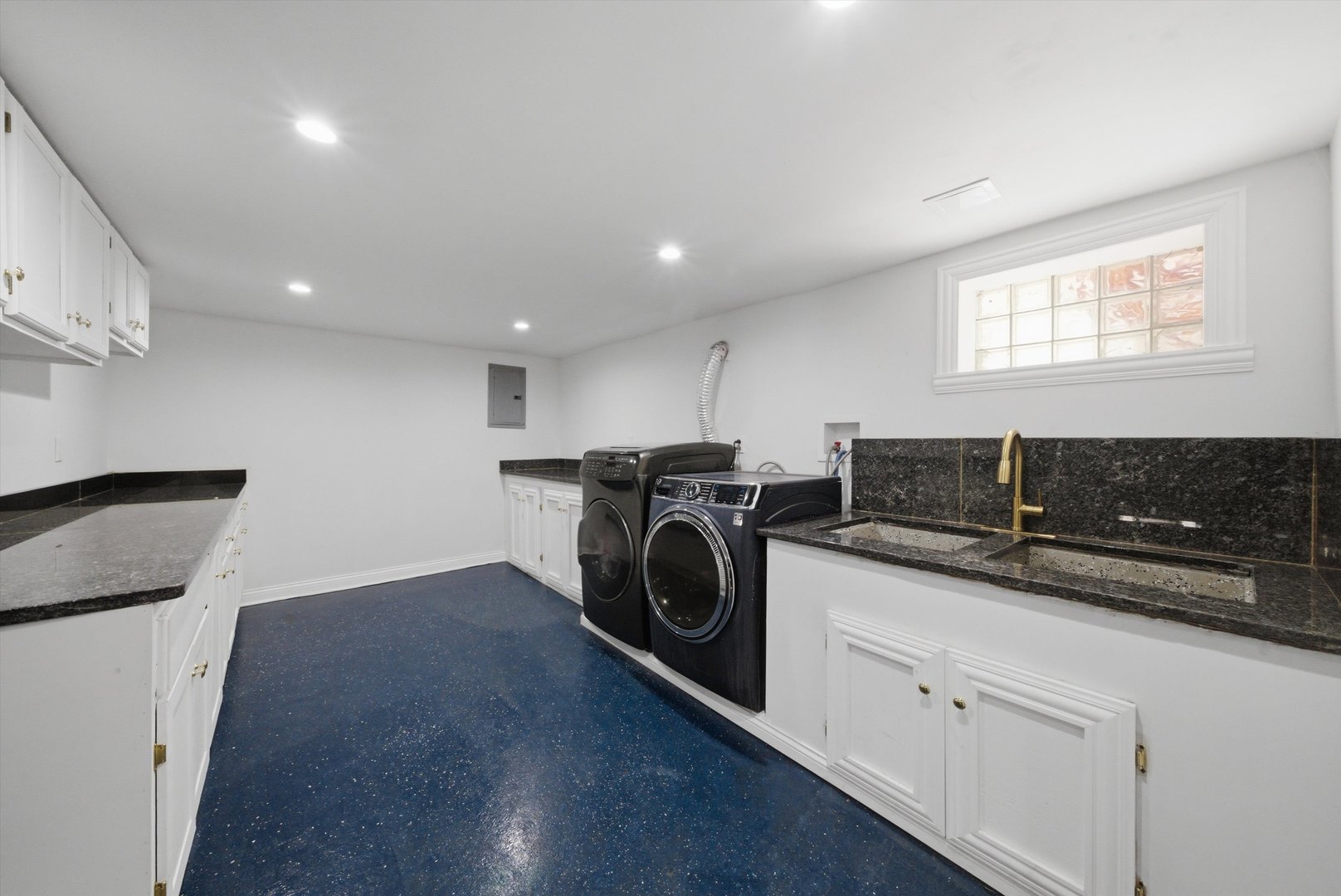 3853 West 83rd Place Chicago, IL 60652 - Photo 20 of 30 a kitchen with a sink and a washer dryer