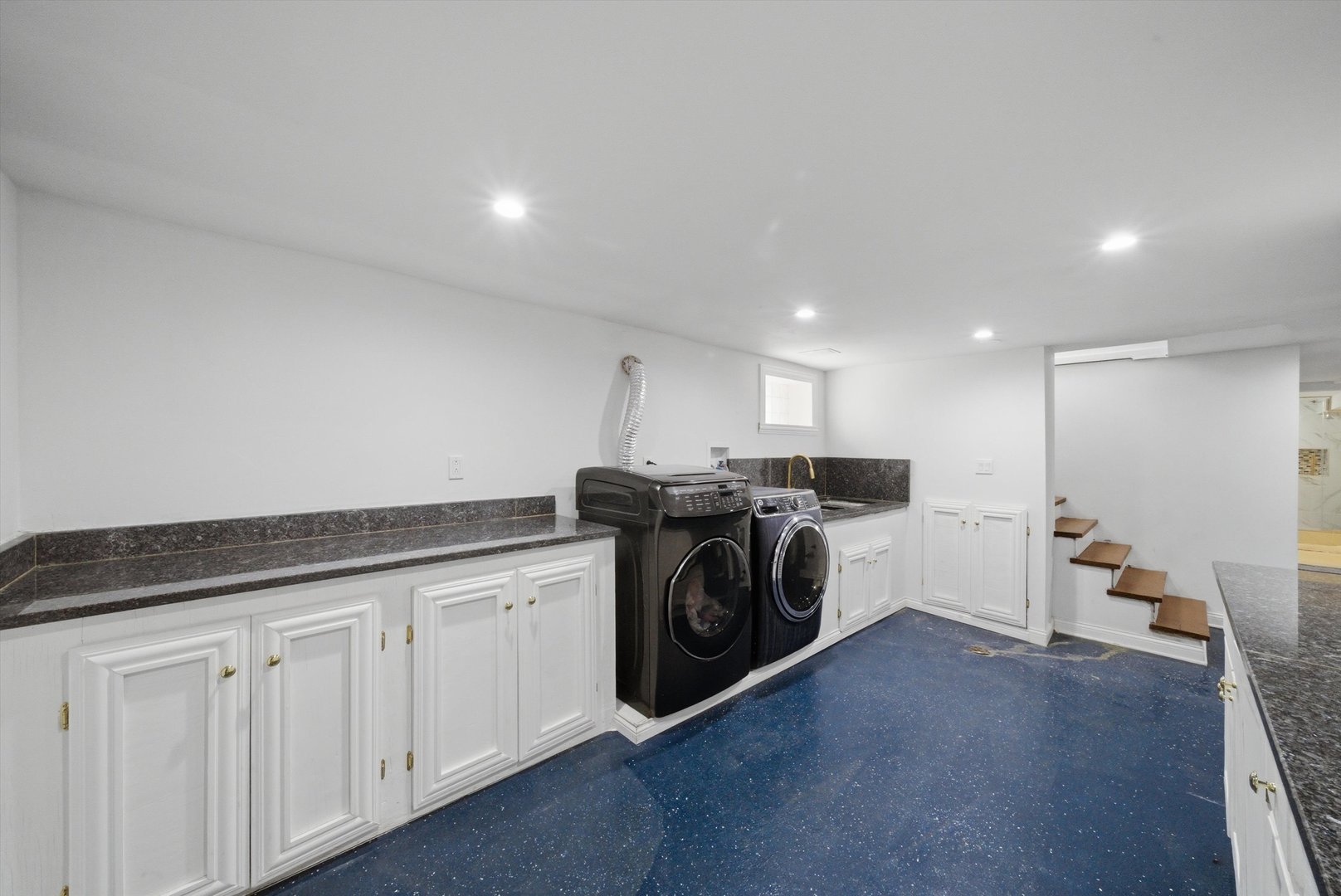 3853 West 83rd Place Chicago, IL 60652 - Photo 24 of 30 a view of a kitchen with sink washer and dryer
