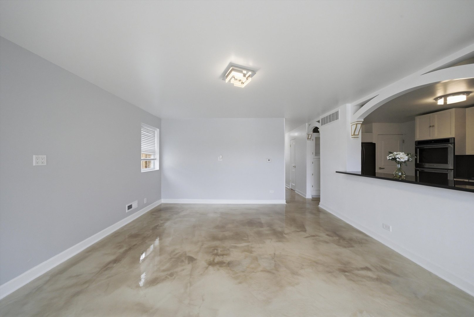3853 West 83rd Place Chicago, IL 60652 - Photo 5 of 30 a view of an empty room with a window
