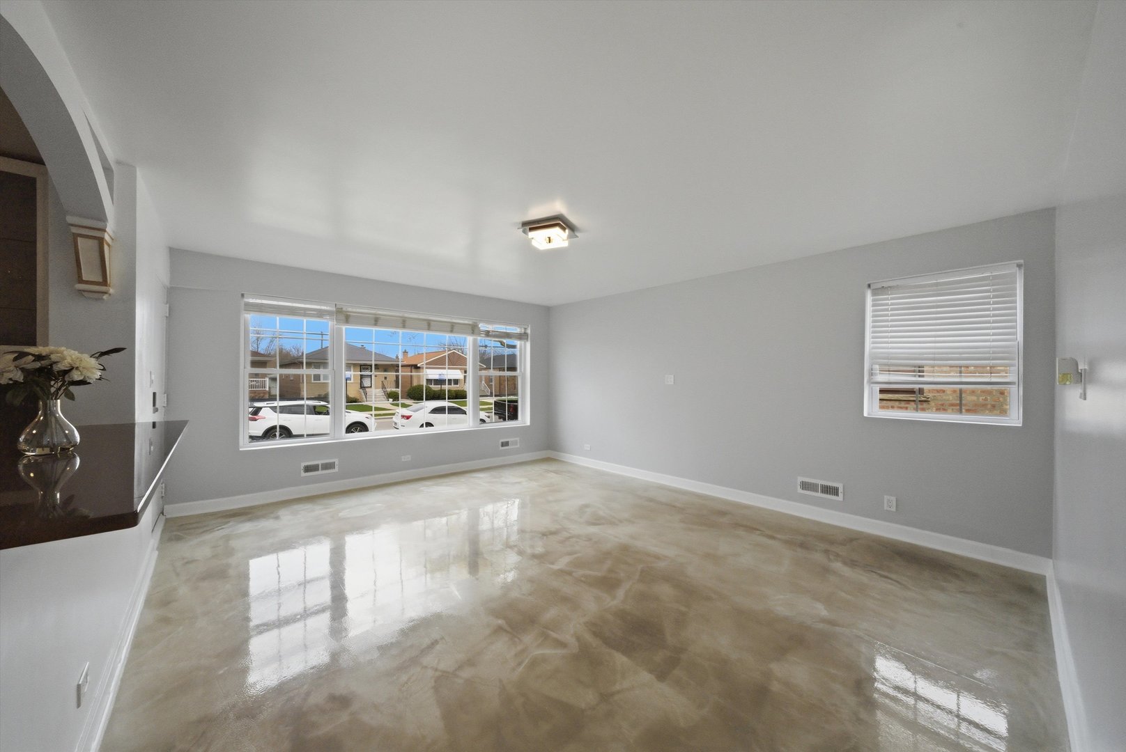 3853 West 83rd Place Chicago, IL 60652 - Photo 6 of 30 a view of a livingroom with furniture and a window