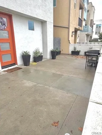 a view of a building with sitting area