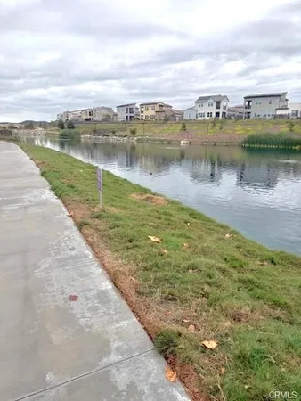 a view of a lake with a city