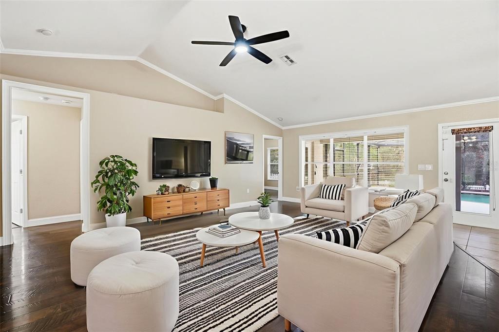 26 Statice Court Homosassa, FL 34446 - Photo 13 of 70 a living room with furniture and a flat screen tv