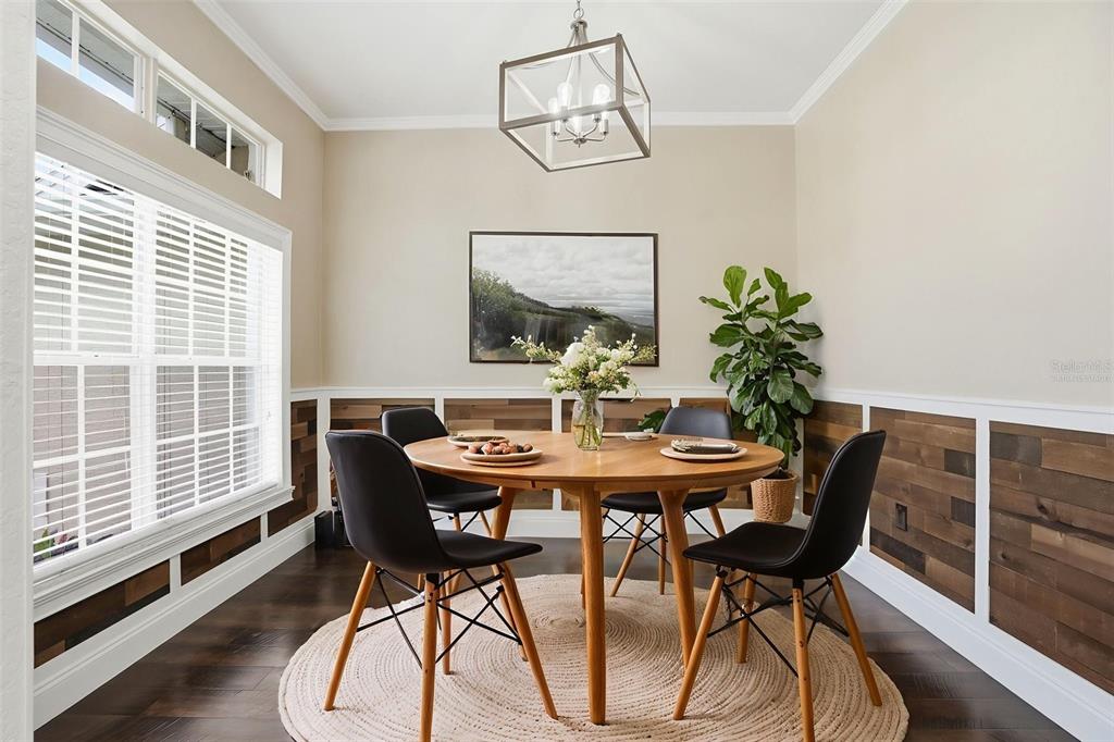 26 Statice Court Homosassa, FL 34446 - Photo 22 of 70 a view of a dining room with furniture window and wooden floor