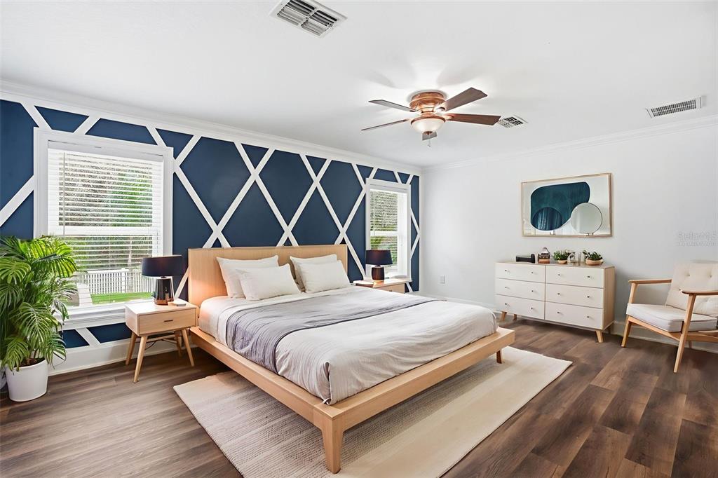 26 Statice Court Homosassa, FL 34446 - Photo 31 of 70 a bedroom with a bed wooden floor and table