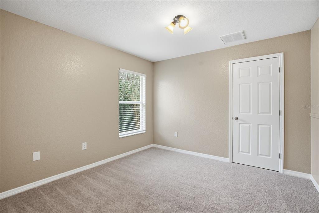 26 Statice Court Homosassa, FL 34446 - Photo 44 of 70 an empty room with windows