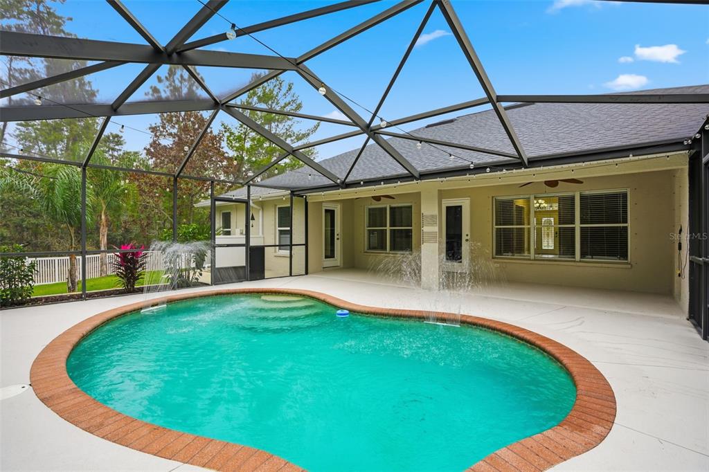 26 Statice Court Homosassa, FL 34446 - Photo 52 of 70 a view of swimming pool with a backyard