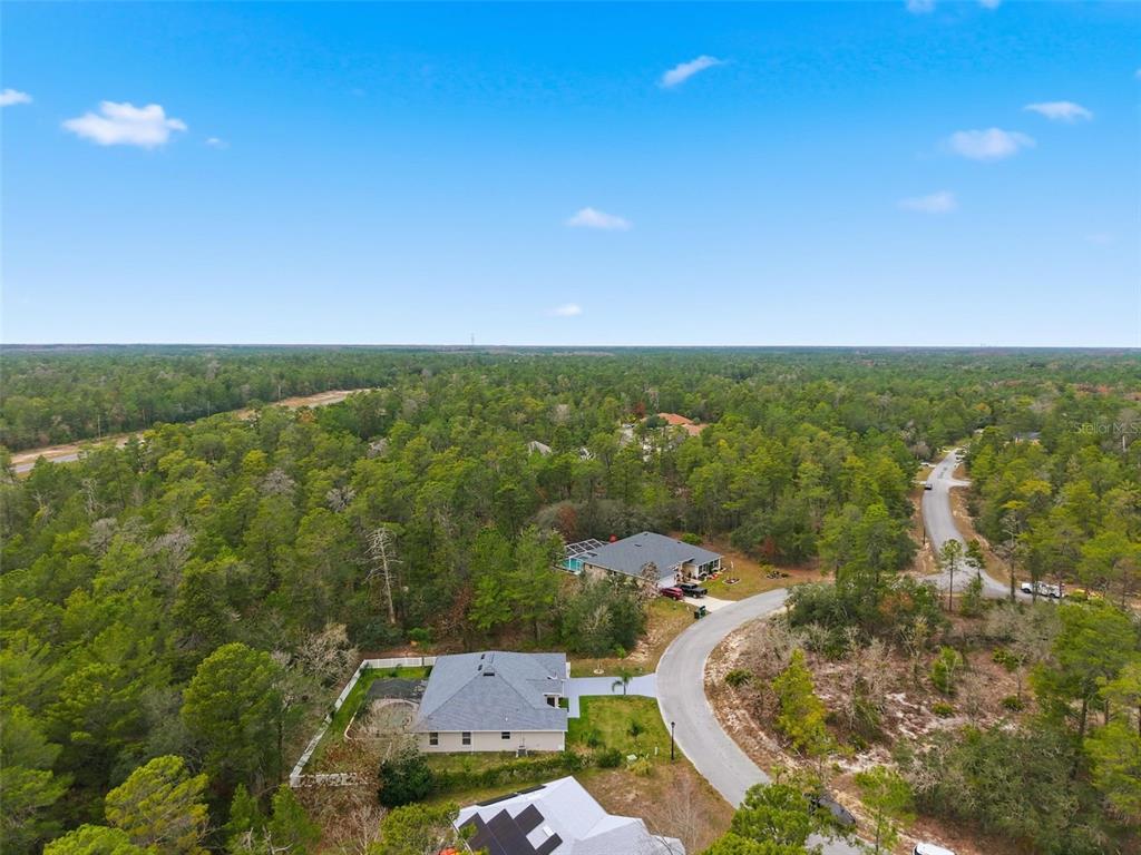 26 Statice Court Homosassa, FL 34446 - Photo 63 of 70 an aerial view of residential houses with outdoor space