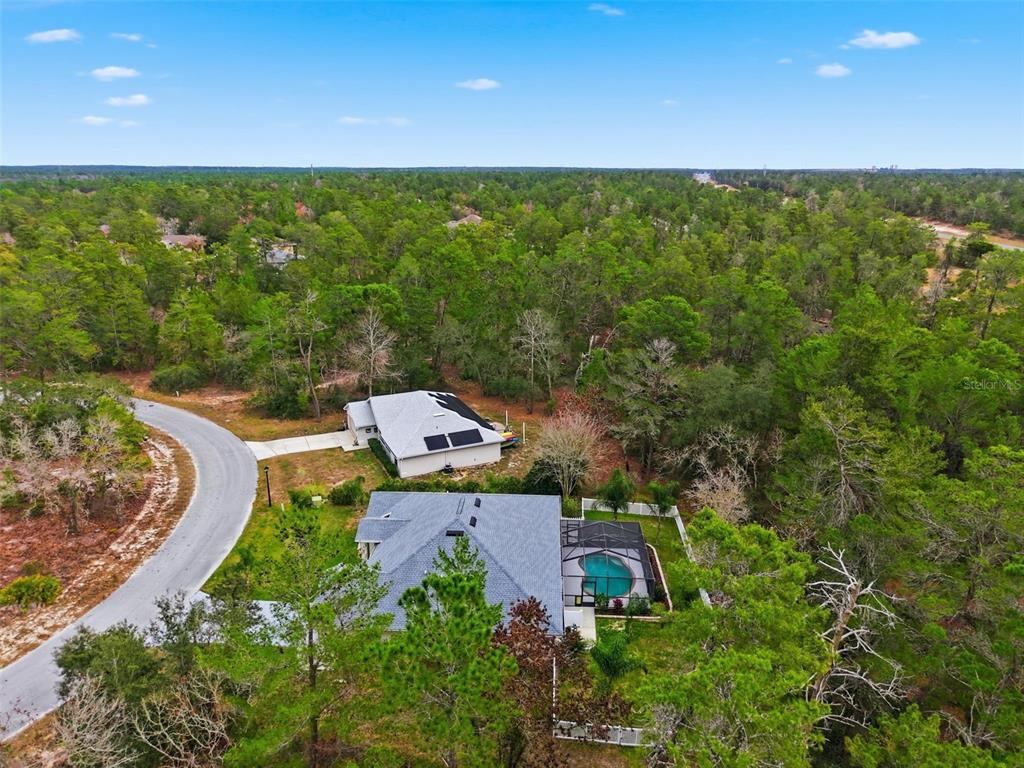 26 Statice Court Homosassa, FL 34446 - Photo 67 of 70 an aerial view of a house with a yard
