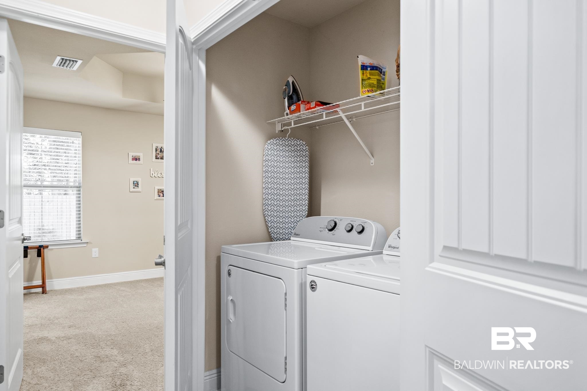 17069 Russet Court Foley, AL 36535 - Photo 18 of 27 Laundry room with independent washer and dryer and light colored carpet