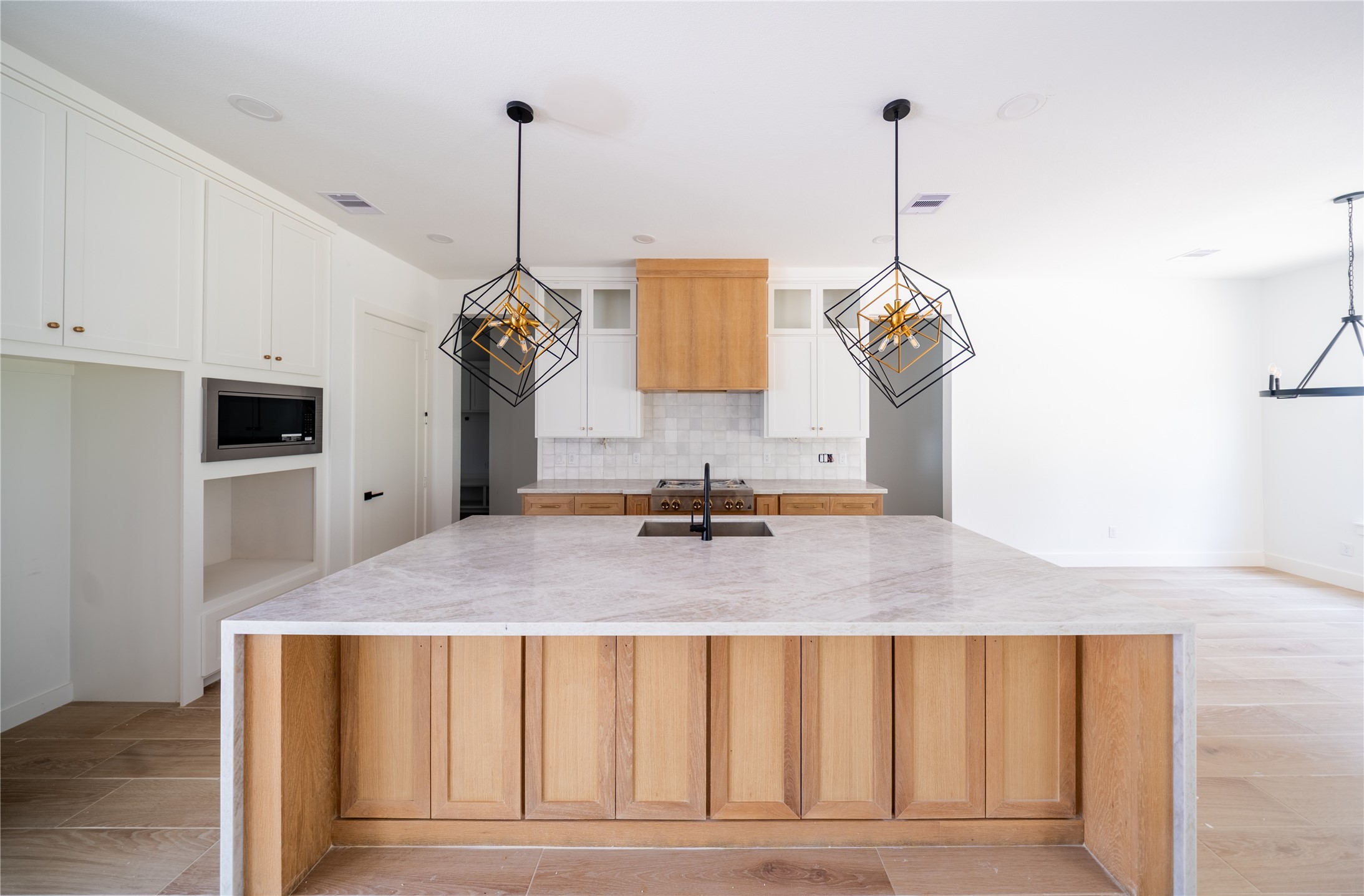 17018 North Saba Court Splendora, TX 77372 - Photo 2 of 10 Beautifully designed kitchen with plenty of natural light & storage space
