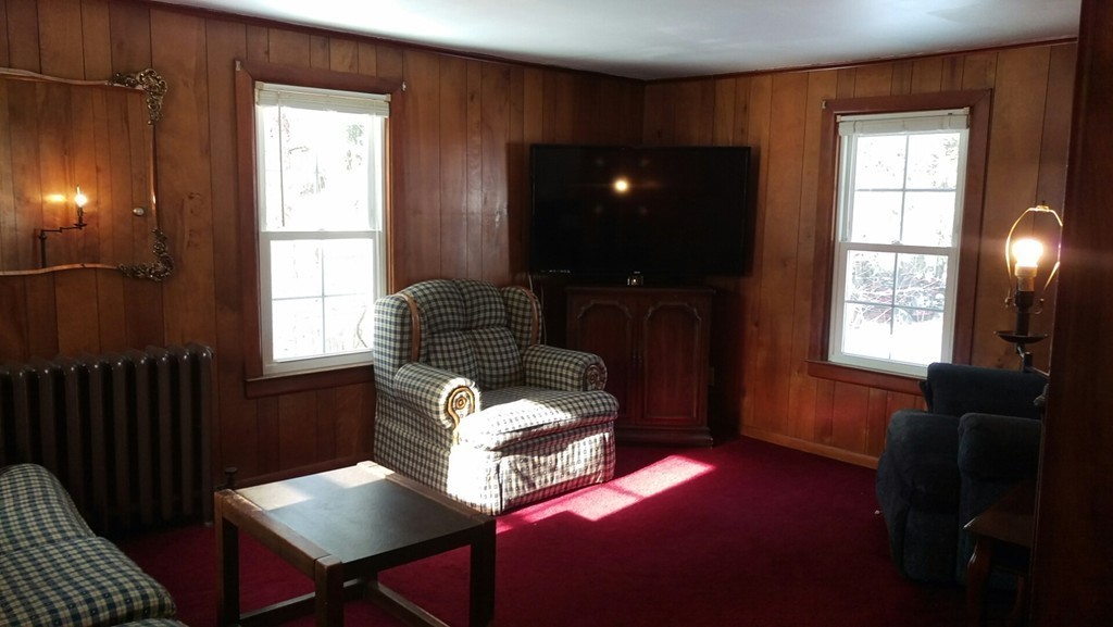 339 Abbe Road Enfield, CT 06082 - Photo 2 of 14 a living room with furniture and a window