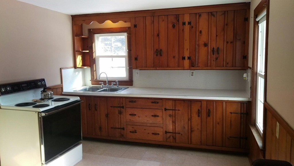 339 Abbe Road Enfield, CT 06082 - Photo 4 of 14 a kitchen with cabinets a window and a sink