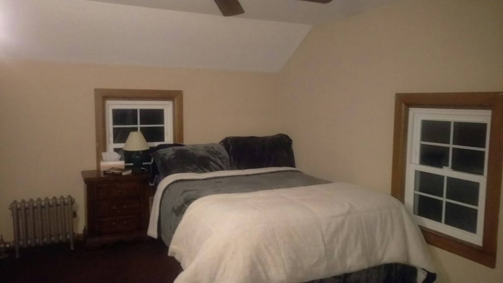 339 Abbe Road Enfield, CT 06082 - Photo 7 of 14 a bedroom with a bed and a window