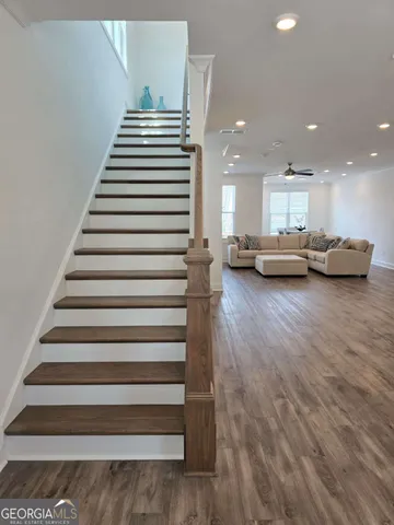 a view of a room with stairs and a couch