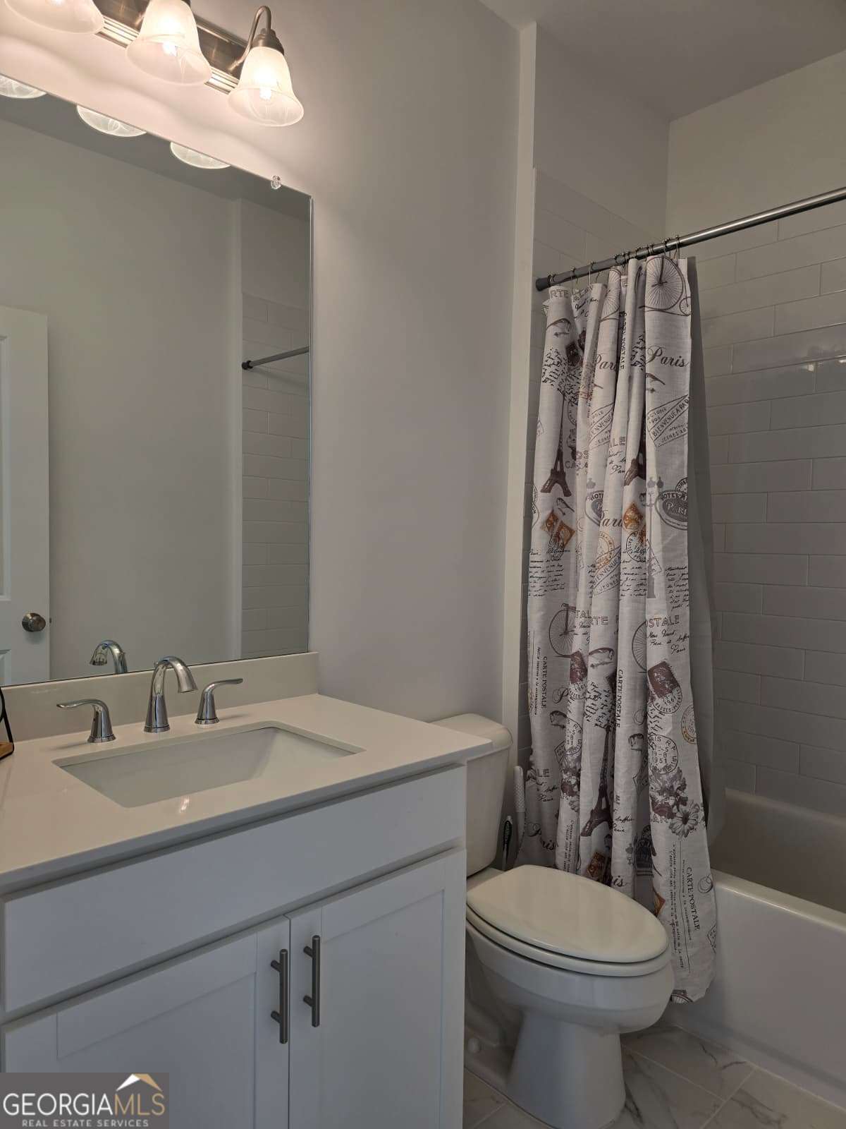825 Green Sapling Trail, Unit 18 Suwanee, GA 30024 - Photo 21 of 44 a bathroom with a sink toilet and shower