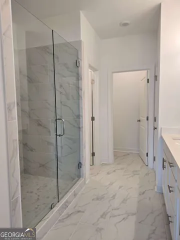 a bathroom with a sink a vanity and a mirror
