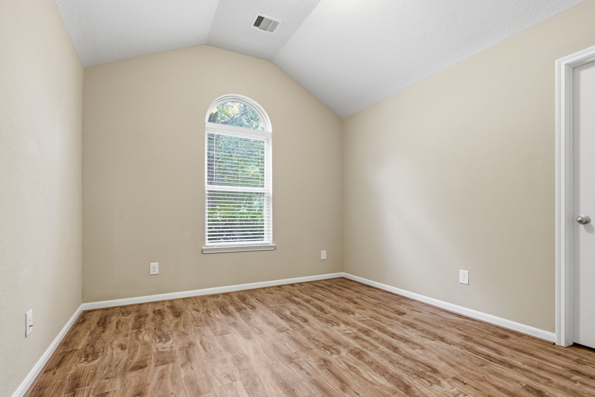 1810 Nantz Lane Conroe, TX 77304 - Photo 12 of 23 an empty room with a window