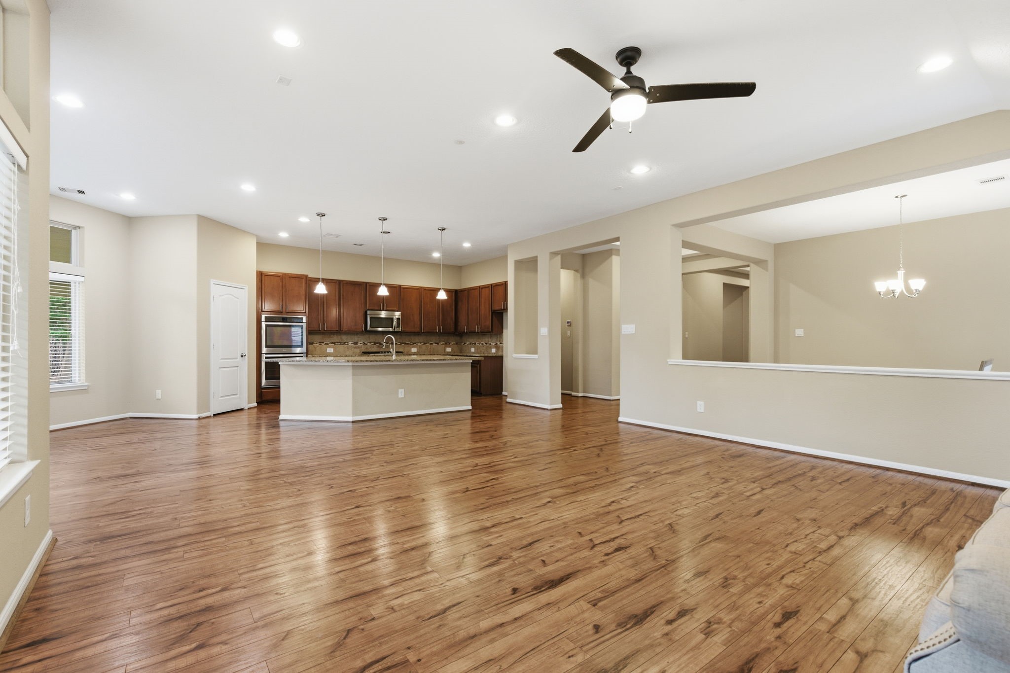 1810 Nantz Lane Conroe, TX 77304 - Photo 5 of 23 a view of a kitchen with a sink and refrigerator