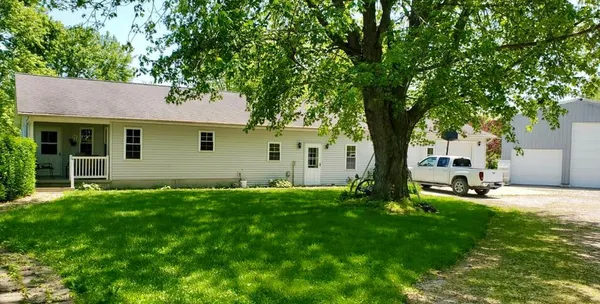 a house view with a garden space