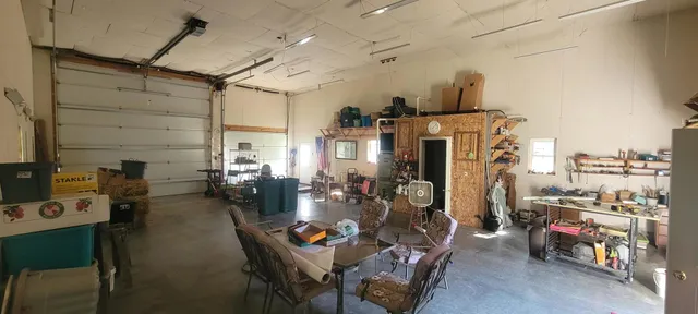 a view of a pathway with a wrought fence