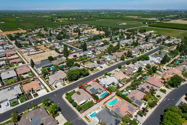 an aerial view of a city with lots of residential buildings