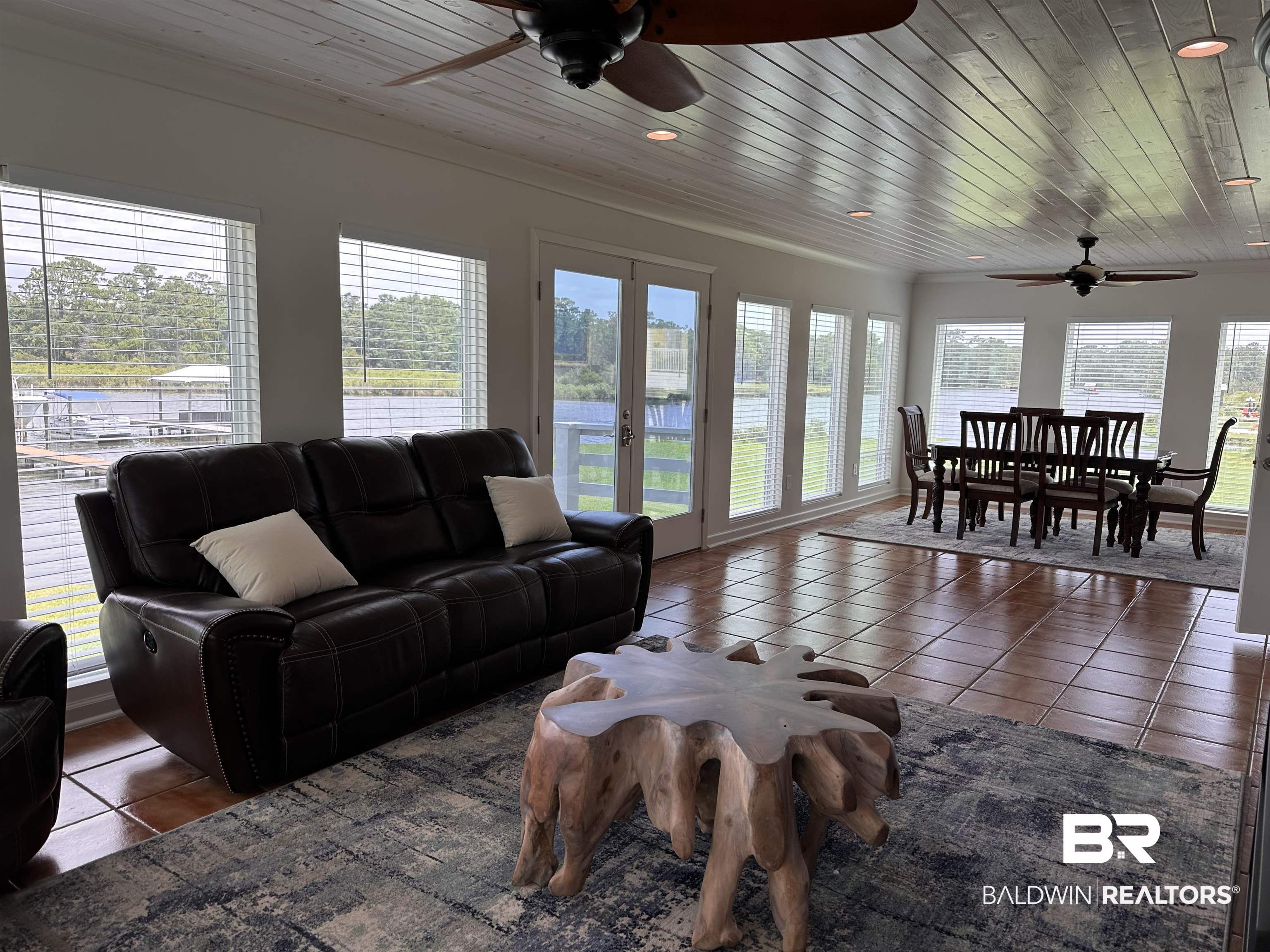 6880 Piney Woods Road Foley, AL 36535 - Photo 8 of 30 Tiled sunroom featuring ceiling fan, french doors, and wooden ceiling