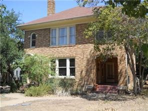 112 Laurel Lane, Unit B Austin, TX 78705 - Photo 1 of 1 a front view of a house with garden