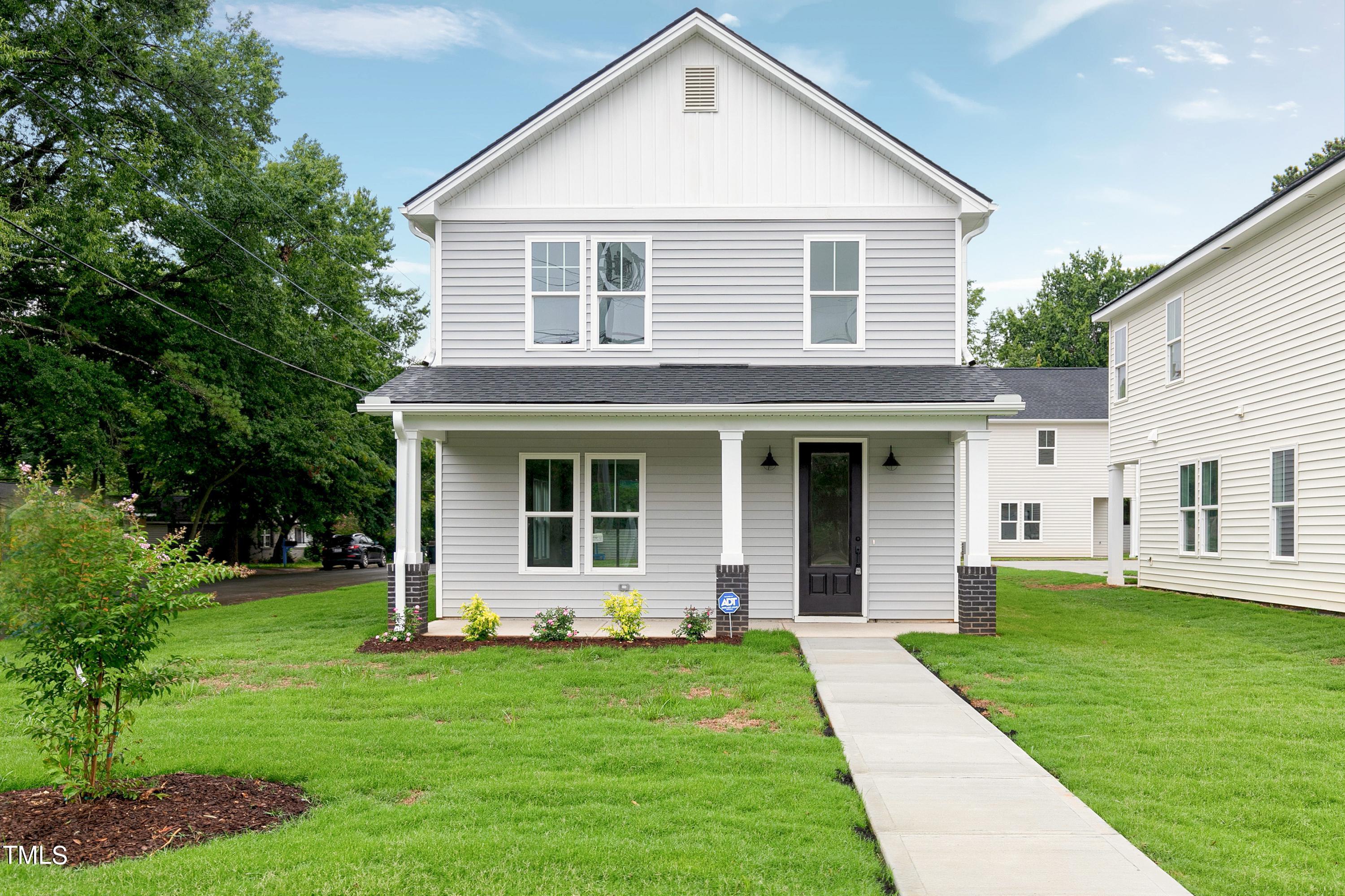 3014 Garner Road Raleigh, NC 27610 - Photo 1 of 39 a front view of a house with a yard