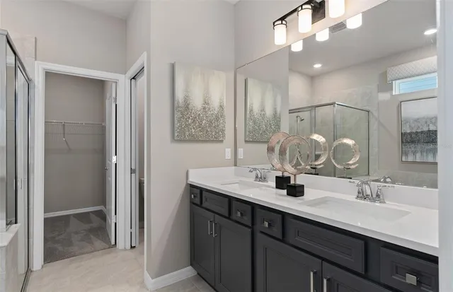 a bathroom with a tub and shower