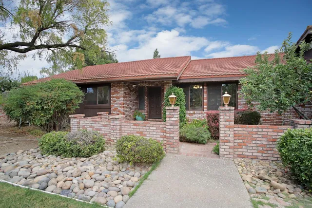 a view of a swimming pool with an outdoor space