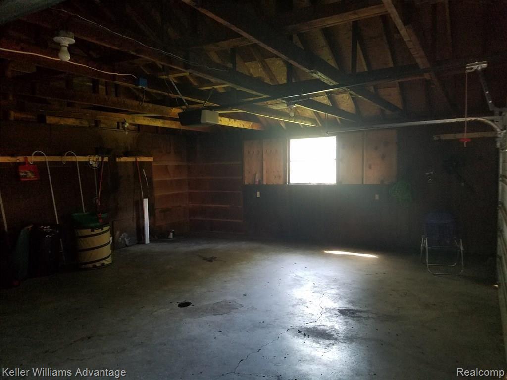 2251 Oxford Road Berkley, MI 48072 - Photo 3 of 15 Inside the garage, room for two cars and a work space