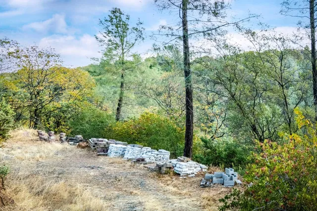 a view of a road with a yard