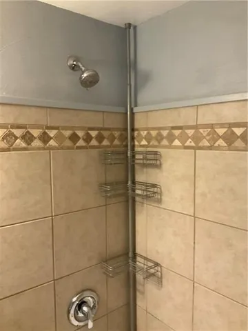 a view of a house with a tree