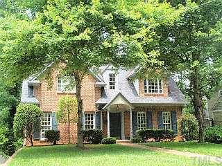 2325 Byrd Street Raleigh, NC 27608 - Photo 1 of 1 a front view of a house with a garden