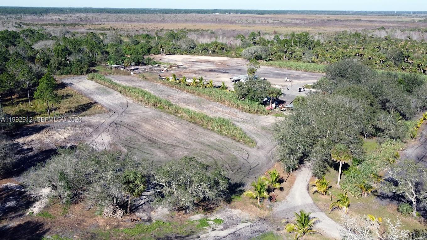 4850 Pioneer 2nd Street Clewiston, FL 33440 - Photo 32 of 34 a view of a road with a yard