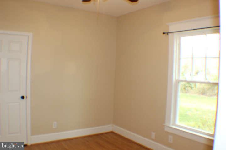 10304 Gunston Road Lorton, VA 22079 - Photo 15 of 30 a view of an empty room with a window