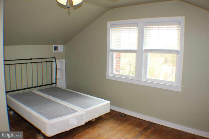 10304 Gunston Road Lorton, VA 22079 - Photo 18 of 30 a view of an empty room with a window