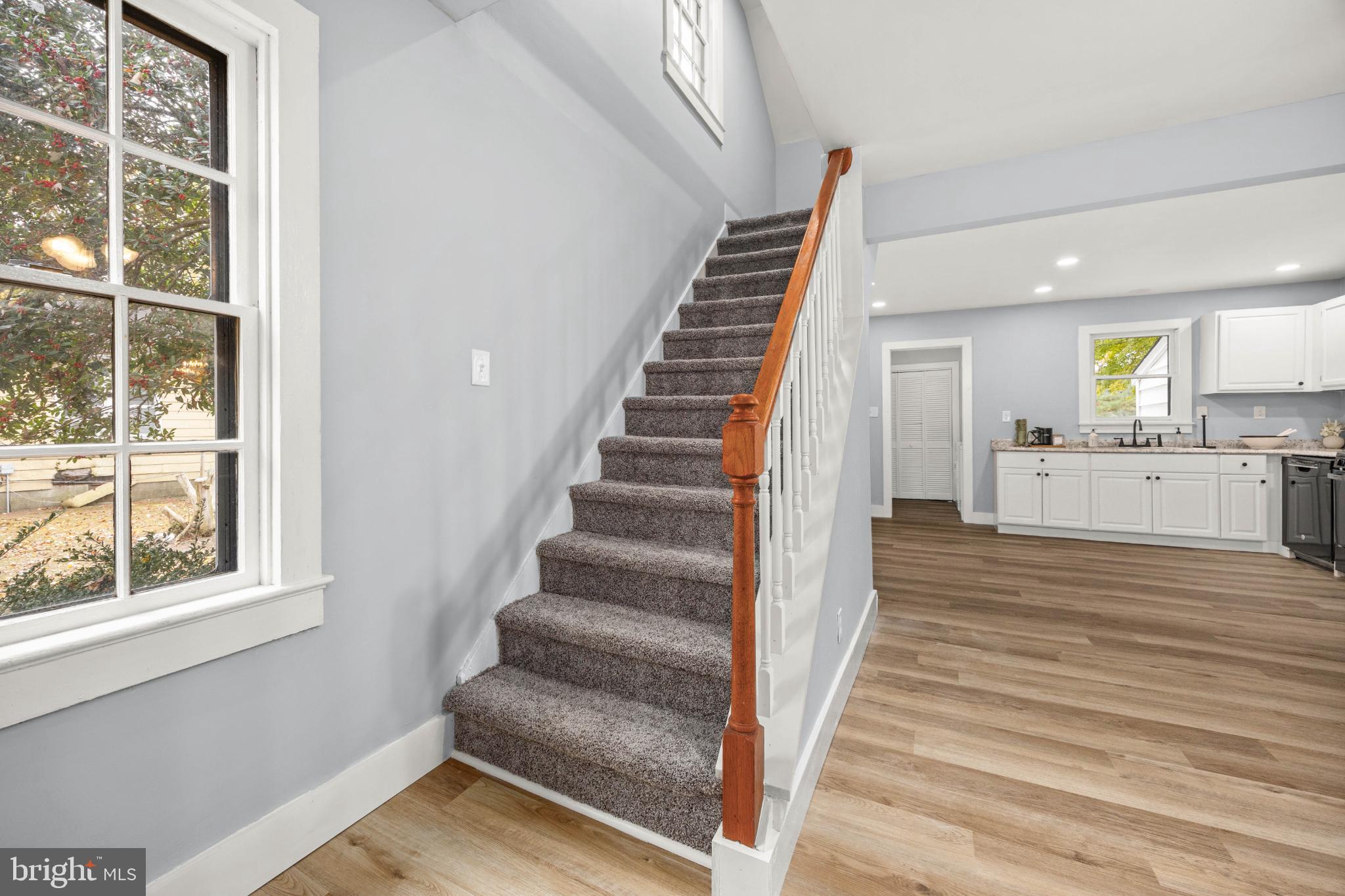 28766 Larry Lankford Road Princess Anne, MD 21853 - Photo 11 of 38 a view of an entryway with wooden floor and staircase