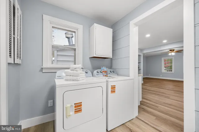 a utility room with dryer and washer